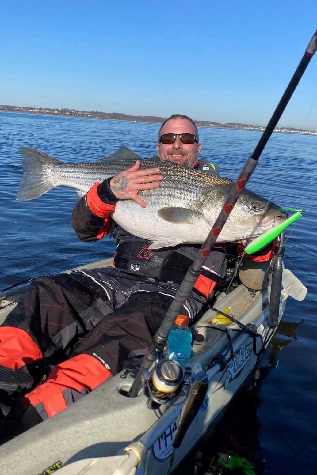 Big striped bass caught from kayak