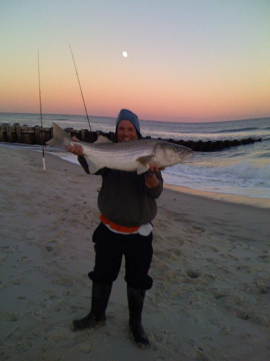 Two anglers with two large tuna